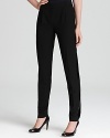 A sequin tuxedo stripe shimmers down the length of these MICHAEL Michael Kors pants for a hint of sparkle with every step.