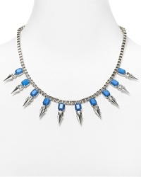 This Aqua statement necklace has a rebel yell, featuring an edgy mash-up of crystals and spikes. It totally turns every look up loud.