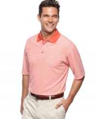 This short-sleeved golf polo from Champions Tour features performance fabric to keep you cool, dry and stylish out on the links. (Clearance)