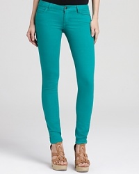 Sleek and chic, these Aqua jeans take you anywhere in slim perfection.