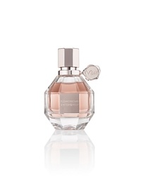 FLOWERBOMB is a floral explosion, a profusion of flowers that has the power to make everything seem more positive. Opulent and full-bodied, the iconic and multi-faceted Viktor & Rolf Flowerbomb bottle is now available in a luxurious, refillable version with a precious pink metallic seal and screw-top cap. Let the magic of Viktor & Rolf live on with the Eau de Parfum Refill to recharge your refillable bottle.