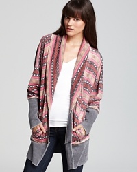 Wrap yourself up in a cozy ALTERNATIVE cardigan--front pockets and a slouchy fit will keep you nice and warm this winter.