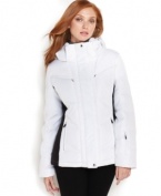 A performance jacket from Calvin Klein features down-blend fill without puffer quilting for a sleek look. Ample external and internal pockets make stashing your gear easy on or off the slopes!