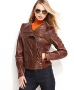 Kenneth Cole Reaction updates supple leather and bomber jacket details with a modern, fitted silhouette. A banded knit hem adds authentic appeal.