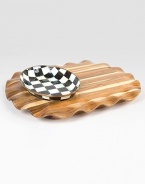 Beautifully handcrafted acacia wood tray is accented by a hand-painted checkerboard patterned bowl of ivory and onyx to create an admired centerpiece.Carved acacia wood will not absorb stains or odorsDurable steel bowl with stainless steel rimHand wash14 X 18Imported