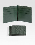 Classic wallet with money clip made of signature microguccisima leather.Six card slotsLeather4W x 4HMade in Italy