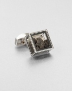 Inspired by the tale of Pandora's box in Greek mythology and featuring the Tateossian signature element of surprise, this glass-box cuff link holds iron meteorites. The Campo del Cielo meteorites originate from the 5000 year old crater found in Argentina, in 1576, each iron meteorite has a rough and natural shape.Sold separatelyBrass and glassEnamel trimMade in United Kingdom