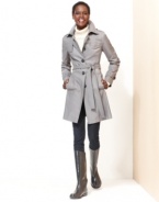 You'll hope for blustery days with DKNY's trench coat. The quilted construction adds a unique touch to this classic silhouette.