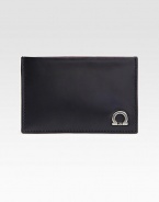 Italian calfskin leather card case with signature gancini ornament detail.Three card slotsLeather4W x 3HMade in Italy