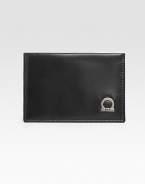 A slim-line design that fits smoothly into an inner blazer pocket in superior calfskin leather with signature gancio detail. Three credit card slots 4½ X 3H Made in Italy