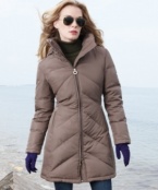 The master of minimalism has done it again: a streamlined puffer coat exudes urban polish and sophisticated style.