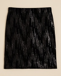 Aqua goes glam with a velvet mini skirt with elastic waist and vertical sequin design throughout.