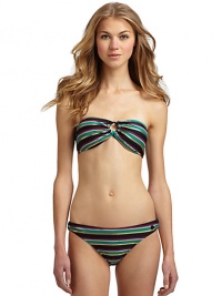 THE LOOKMultistripe print with metallic touchesBandeau top gathered at center with O-ringPadded cups with side boningLogo-embossed button at sideBack clasp closureTHE MATERIAL80% nylon/20% spandexFully linedCARE & ORIGINHand washImportedPlease note: Bikini bottom sold separately. 