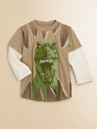 Open wide but stay out of the way of this menacing dinosaur who looks ready to pounce on a tee with layered-look waffle sleeves.Ribbed crewneck with tooth designLong sleeves with a layered waffle textureFront screened design, including more teeth at the hem50% cotton/50% polyester; cotton sleevesMachine washMade in USA of imported fabric