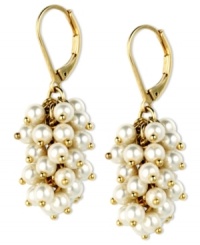 Shake things up! Anne Klein's drop earrings feature plastic pearls in chic clusters. Crafted in gold tone mixed metal with leverback closure.