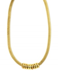 Become a golden goddess. Anne Klein's collar necklace showcases a mesh chain with shiny accents at the bottom. Crafted in gold tone mixed metal. Approximate length: 16 inches + 2-inch extender.