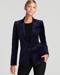 Plush velvet lends a trend-right look to a structured, fitted Elie Tahari blazer.