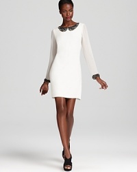 An embellished peter pan collar and cuffs lend sparkling luxury to a sweet, feminine dress from ABS by Allen Schwartz.