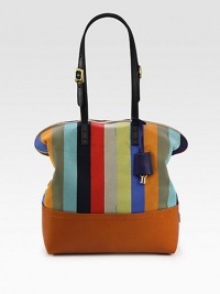 Roomy zip-top bag crafted from vibrant canvas and rich leather trim.Adjustable leather shoulder straps,8¾-10¼ dropTop zip closureCenter zip compartmentTwo inside open pocketsLinen lining11W X 13H X 5¼DMade in Italy