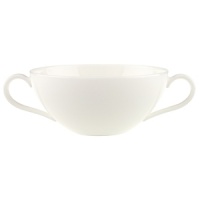 Anmut will be the choice for purists; it is an undecorated white that beautifully shows off the glamorous forms and quality bone china. Dishwasher and microwave safe. Accessories shown: oval platter, round vegetable bowl, creamer, sugar bowl.