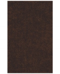 Add rich, shimmering chocolate tones to any modern room with the Metallic area rug from Dalyn. Hand-tufted of soft polyester, this high-luster shag area rug puts comfort and fun back in floor decor.