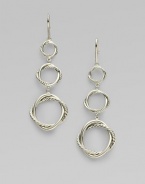 From the Infinity Collection. Graceful, graduated circles, each formed of interwoven strands of smooth and cabled sterling silver, connect to form these elegant drops. Sterling silver Drop, about 2 Ear wire Imported