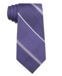 Simple and subtle. Pair this striped DKNY tie with a crisp shirt from your closet for instant sophistication.