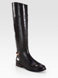 Beautiful equestrian-inspired silhouette of rich leather, backed by gleaming signature hardware. Stacked heel, 1 (25mm)Shaft, 17¼Leg circumference, 14Leather upperSide zipLeather lining and solePadded insoleImported