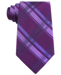 Plaid goes powerful in this statement silk tie from Calvin Klein.