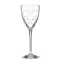 Diamond-shaped cuts delicately catch the light in these classic wine glasses from kate spade.