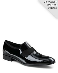 Patent leather slides with rubber sole grosgrain ribbon detailing across the front. Features a smooth finish bottom.