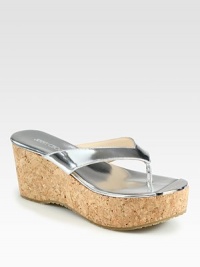 A cork wedge lifts this warm weather essential in lustrous metallic leather. Cork wedge, 3 (75mm)Cork platform, 1½ (40mm)Compares to a 1½ heel (40mm)Metallic leather upperMetallic leather liningRubber solePadded insoleMade in Italy