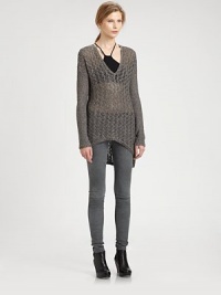 Woven from the finest alpaca and silk, this open-knit sweater is reinvented by dropped shoulders and an asymmetrical hi-lo hem. V-neckDropped shouldersLong sleevesAsymmetrical hi-lo hem75% alpaca/25% silkDry cleanImported of Italian fabricModel shown is 5'10 (177cm) wearing US size Small.