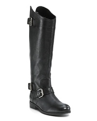 Classic equestrian style canters at a stylish speed with these tall leather boots. Gleaming buckles echo their horse-riding heritage. By DV Dolce Vita.