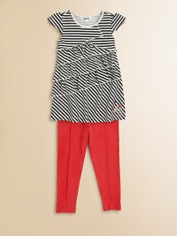 Playful with a touch of chic, this undeniably cute combo sports horizontal and diagonal stripes, tiered ruffles and colorful matching leggings. Tunic Jewel necklineCap sleevesAsymmetrical tiered ruffles Leggings Elastic waistbandPull-on styleFront seams57% cotton/38% polyester/5% spandexMachine washImported