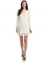 THE LOOKOpen weave crochet designScalloped v-neck Long scalloped cuff sleevesScalloped hemTank dress underlayTHE FITAbout 35 from shoulder to hemTHE MATERIALCottonPartially linedCARE & ORIGINHand washImportedModel shown is 5'9 (175cm) wearing US size Small. 