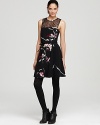 A dash of floral and a touch of lace brings this French Connection dress to the forefront of fashion.