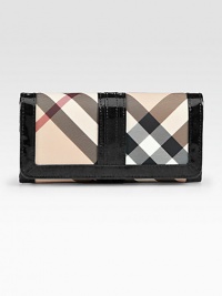 A sleek continental silhouette crafted from signature check PVC and rich leather trim.Snap button closureFive open pocketsOne zip pocketFifteen credit card slotsNylon lining7½W X 3½H X 1/2DMade in Italy