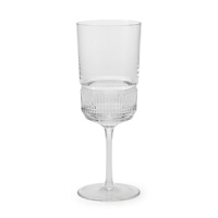 This retro Ralph Lauren white wine glass gleams in hand-blown crystal, accented with hand-cut vertical grooves at the base for a deco-inspired look.