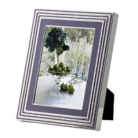 Sparkling silver plate combines with rich lavender-Vera Wang's signature hue-to create a frame with contemporary yet decidedly deco elegance.