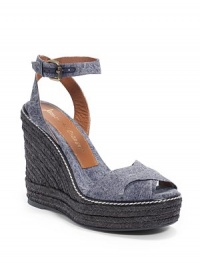 THE LOOKCrisscross denim upperAdjustable ankle strapHemp-covered wedge, 5 (125mm)Hemp-covered platform, 1 (25mm)Compares to a 4 heel (100mm)THE MATERIALDenim upperLeather liningRubber soleORIGINMade in Spain