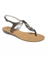 Glam it up. Metal embellishments add just the right finishing touches to the cool Glitz Flat thongs by Marc Fisher.