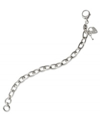 Classic cool. Fossil's link bracelet is crafted from silver-tone stainless steel with a silver-tone charm for a subtle and stylish touch. Approximate length: 7-1/2 inches.