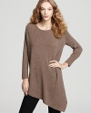 A stylish asymmetric hem give this extra-soft sweater an edge over the competition this fall.