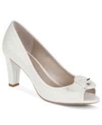 Prim and proper from sunrise to sunset. Etienne's Aigner Day pumps are topped with an elegant buckle at the toe.