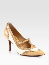 Perforated details and a thin t-strap complete this sophisticated point toe pump of snake-print leather. Shiny leather heel, 3¾ (85mm)Snake-print leather upperAdjustable t-strapPoint toeLeather lining and solePadded insoleImportedThis style runs large. We recommend ordering one half size down for a standard fit. 