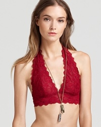 Free People's mesh-lined, lace bralette is a pretty must-have under all your halter tops. Style #F763O915.