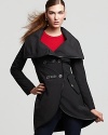 Cut a chic silhouette in this artfully shaped Mackage trench coat boasting a high-low hem and oversized collar.