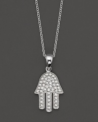 This protective Hamsa pendant is set in pave diamonds and 14 Kt. white gold.