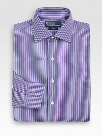 A trim-fitting look in crisp, two-ply cotton with preppy stripes for a refined look. Buttonfront Moderate spread collar Embroidered logo detail Cotton Machine wash Imported 